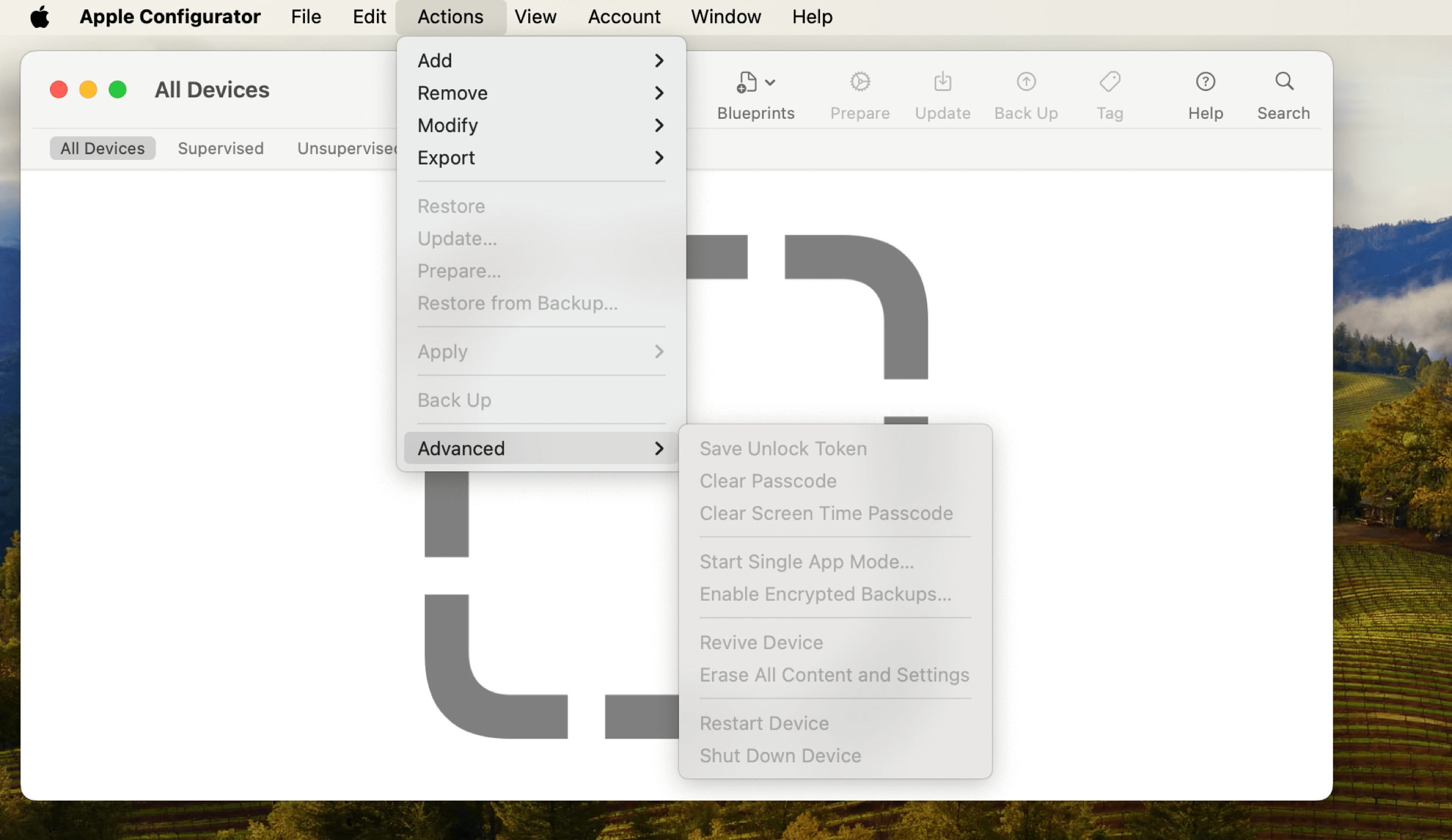 Apple Configurator application with the "Actions" menu open, showing advanced device management options including "Save Unlock Token", "Clear Passcode", and "Revive Device".