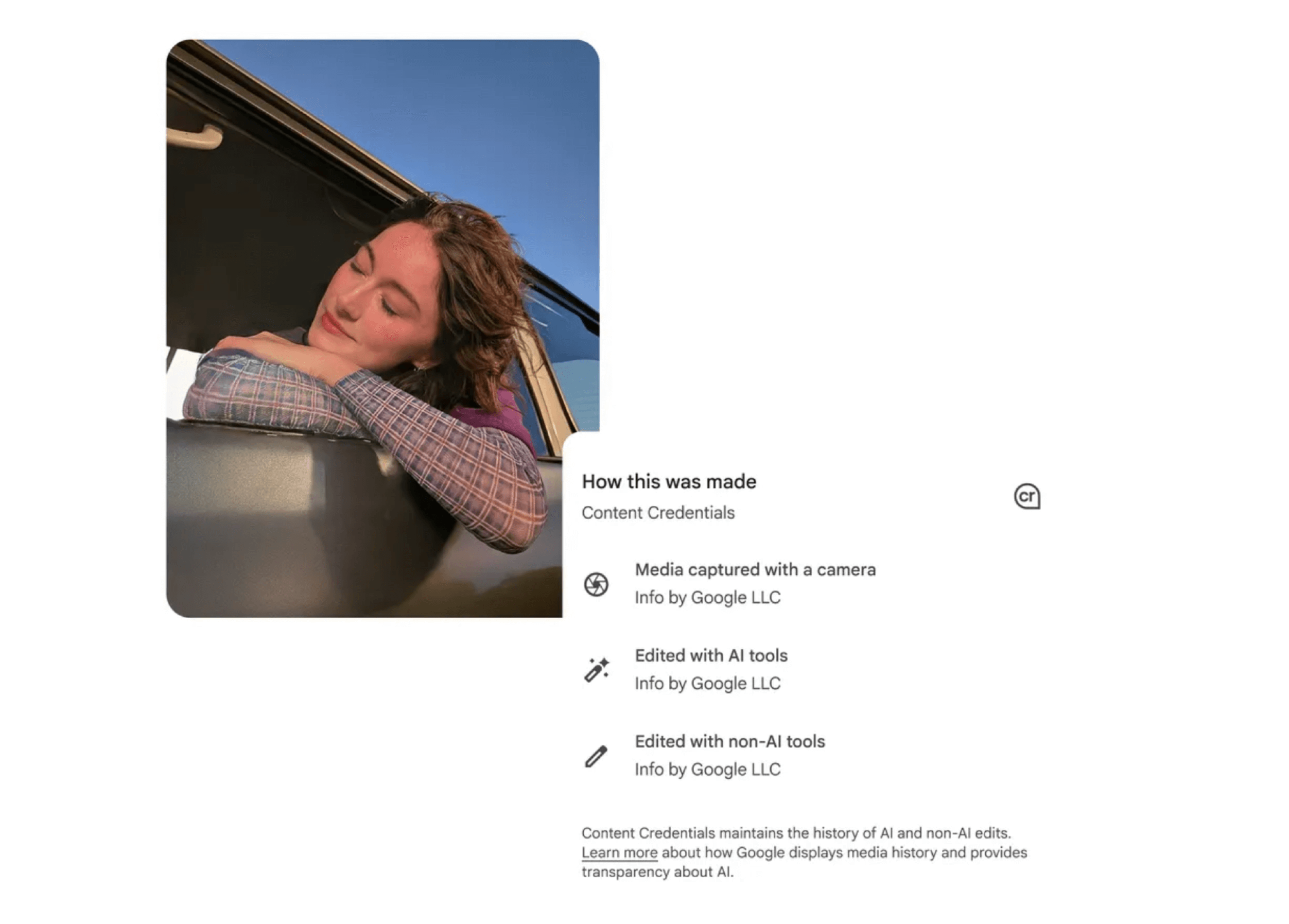 A young woman resting her head on her arms, outside of a car, with her eyes closed, and a clear blue sky visible.
