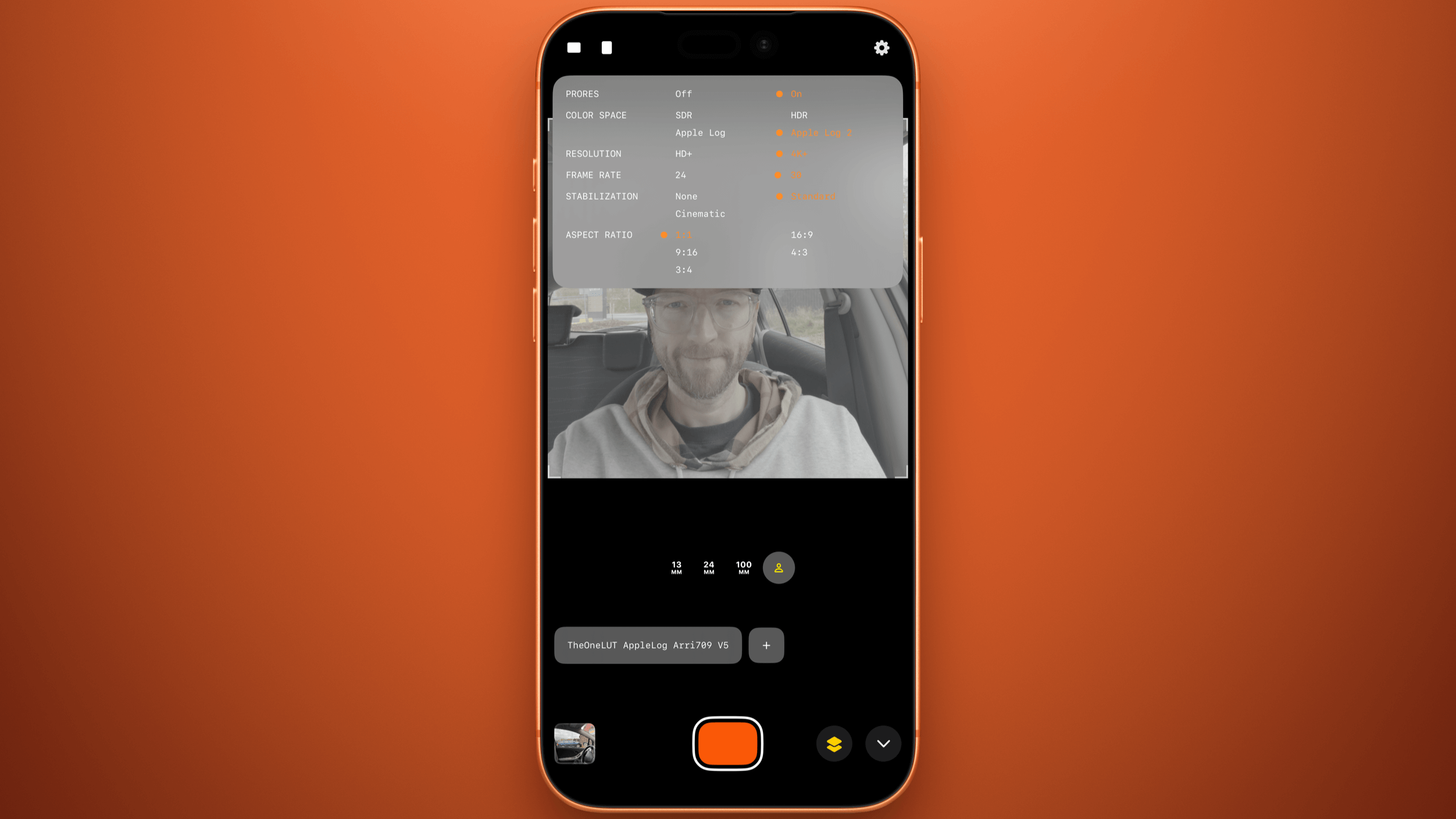 Smartphone screen displaying a video recording interface with settings menu open, showing options for Prores, Color Space, Resolution, Frame Rate, Stabilization, and Aspect Ratio, with a selfie of a man visible in the video preview. The recording interface includes settings options, a record button, and icons for additional functions.