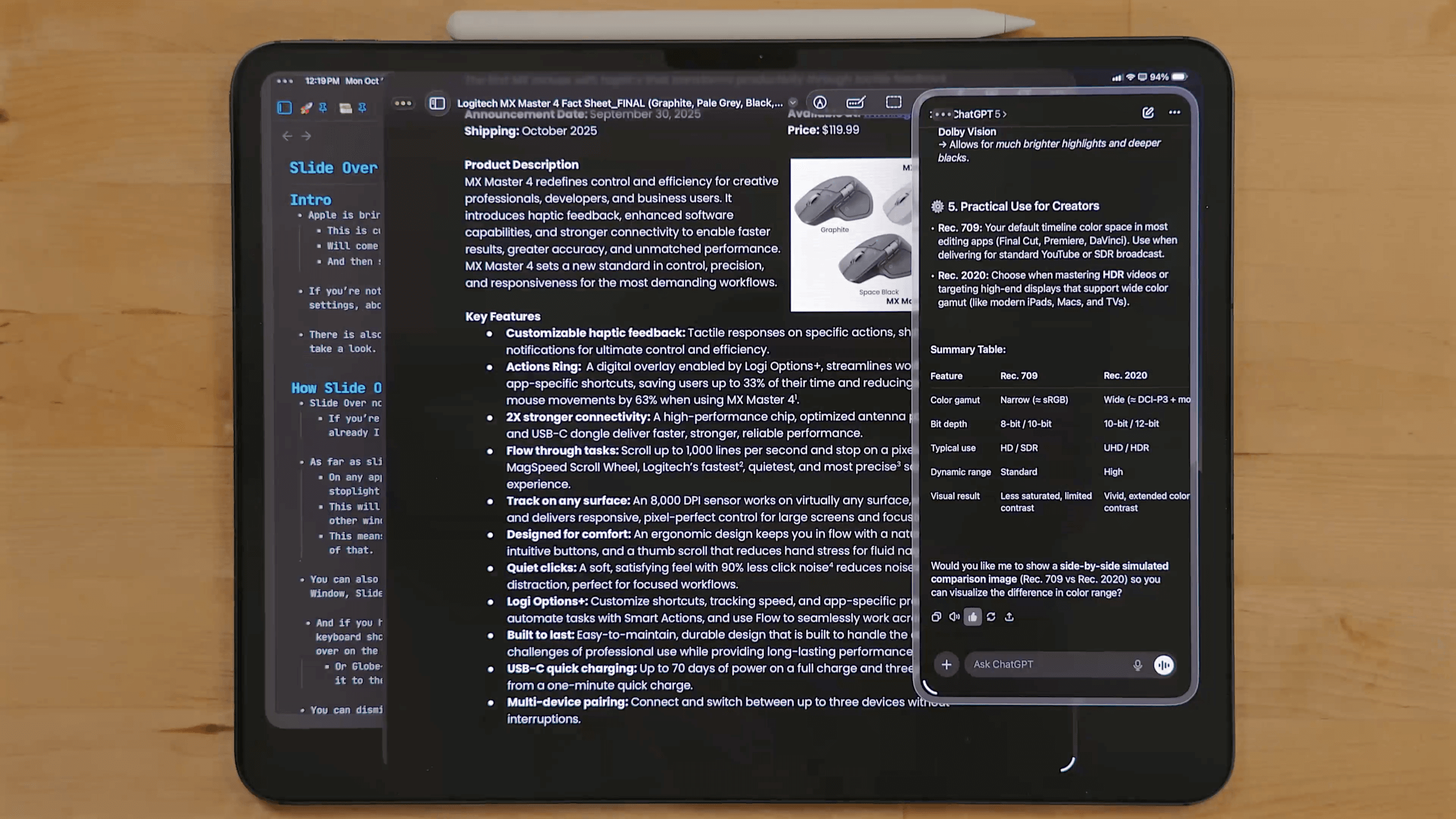 A black tablet displaying a Logitech MX Master 4 product fact sheet, with a chat interface at the bottom asking if the user would like to see a comparison image between Rec. 709 and Rec. 2020 color ranges. The fact sheet details product features, key features, and a summary table comparing Rec. 709 and Rec. 2020 settings for creators. The tablet is open on a dark wooden surface, with a white pen resting on top.
